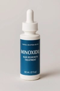 Frasco de minoxidil em solução tópica