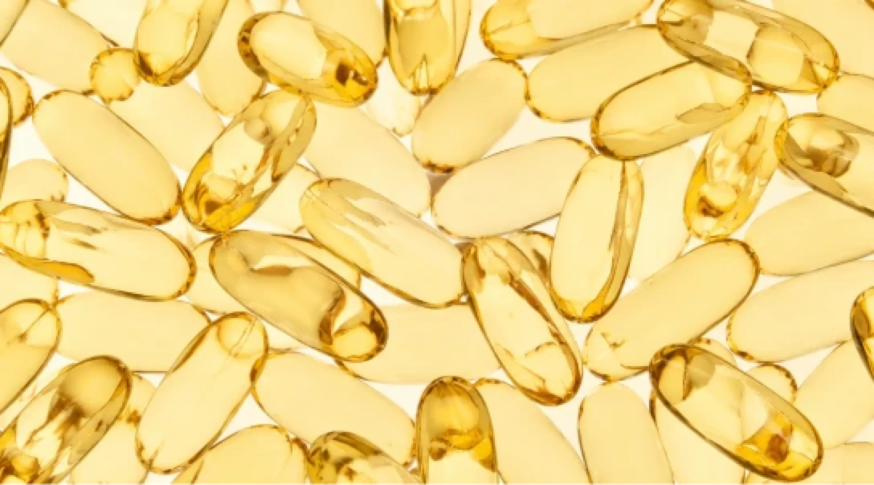 Frutas cítricas e cápsulas de suplemento — vitaminas e queda de cabelo